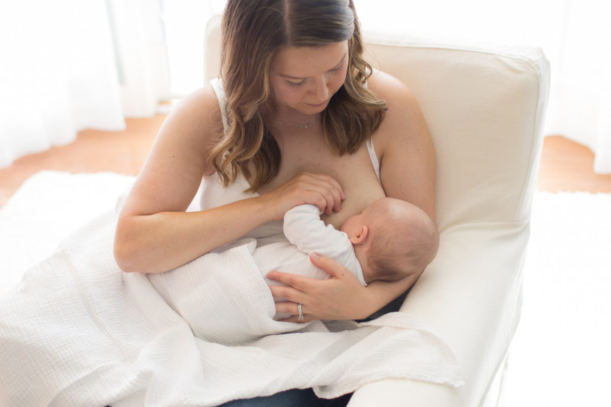 women breastfeeding baby